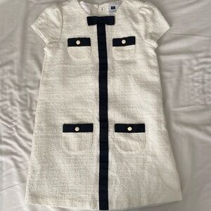 Janie and Jack white tweed dress with black bow and gold button detail. Size 6